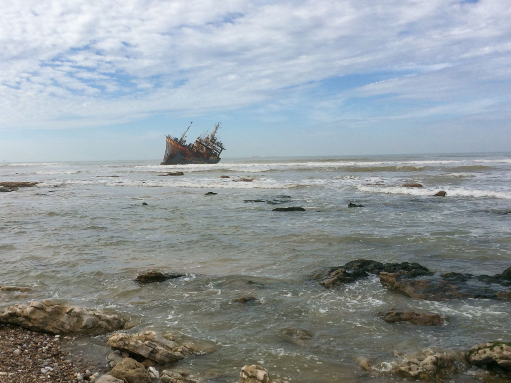 A beached Icelandic fishing trawler with the appropriate name of Que Sera Sera.